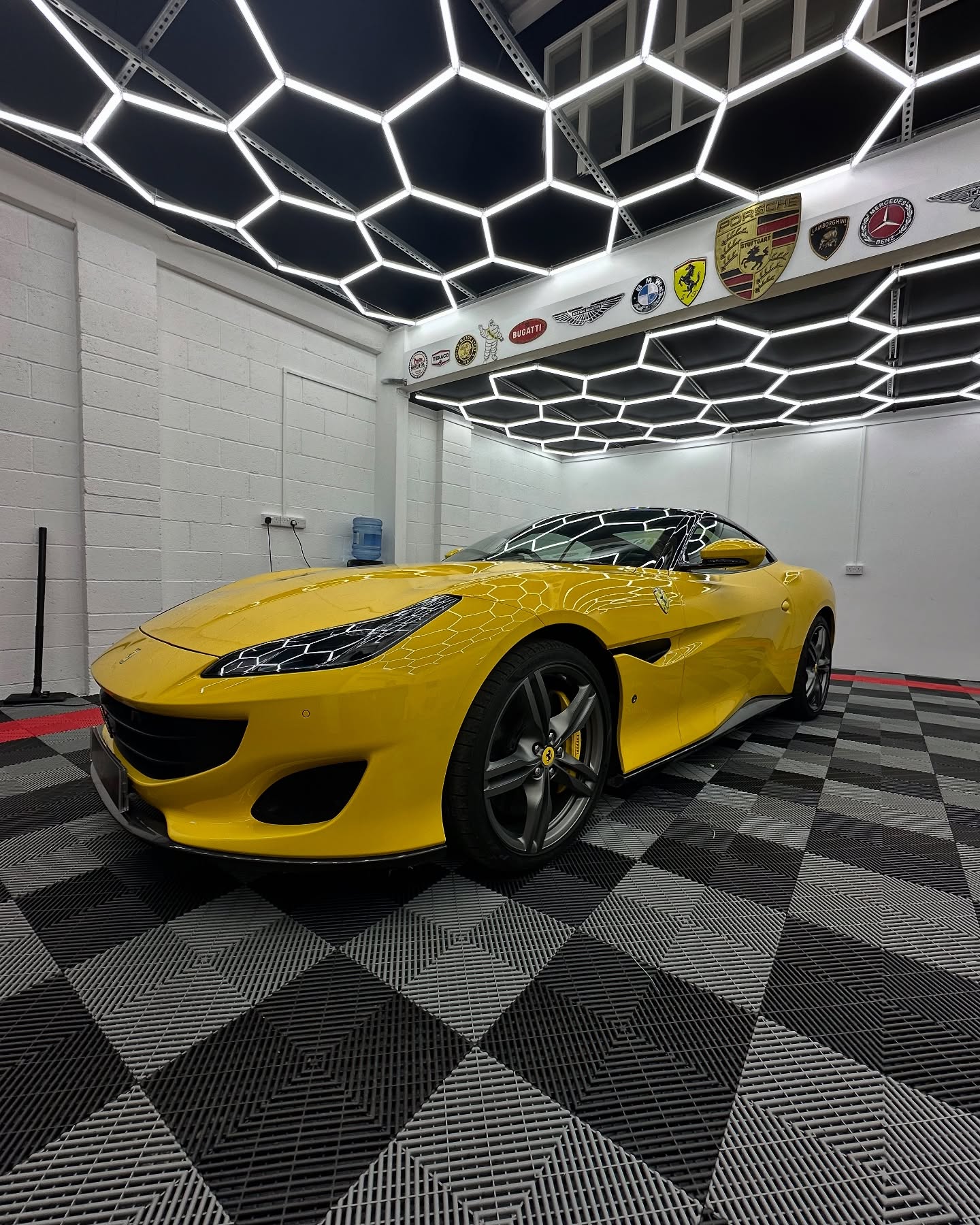 Side view of yellow Ferrari