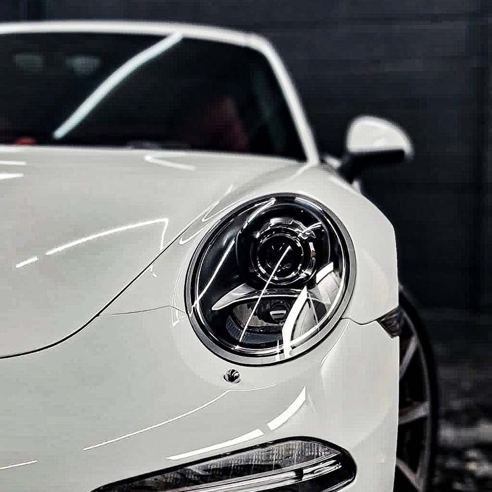 Close up of a Porche headlight